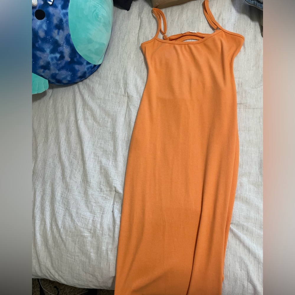 Slim and stretchy open back dress